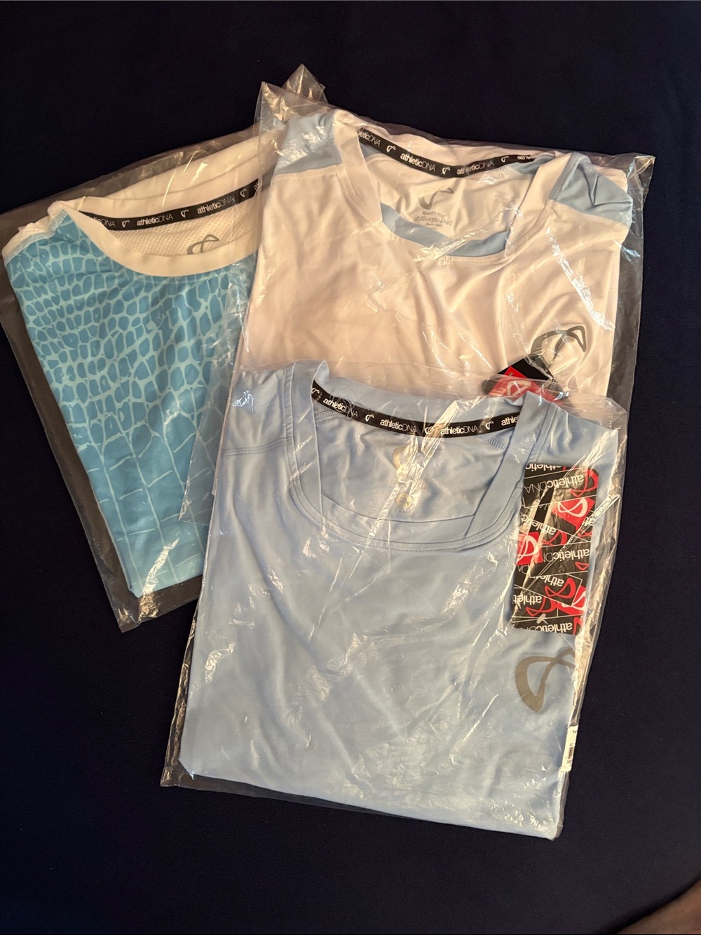 Athletic DNA Men’s XL White & Light Blue shorts (2) & shirts (3), new in plastic